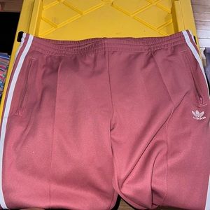 Adidas pink joggers.